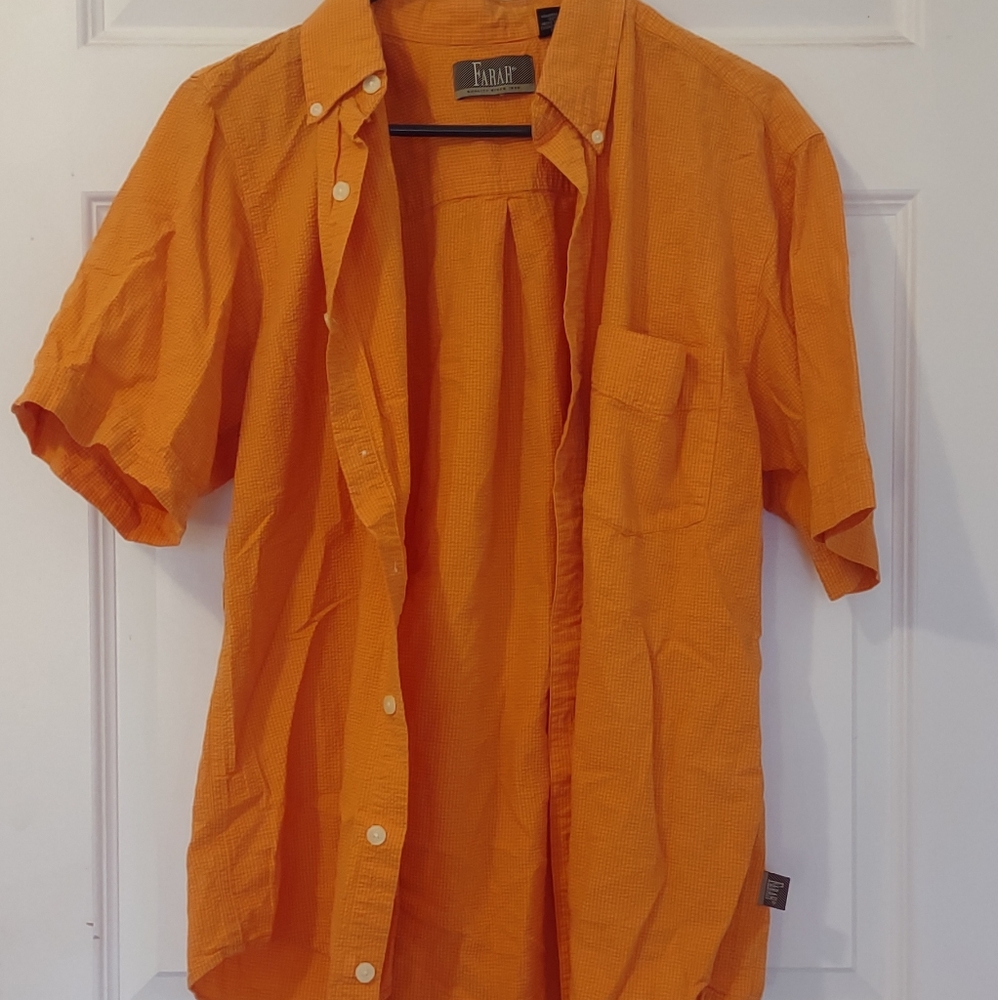 Men's orange colored collared shirt sleeve button up